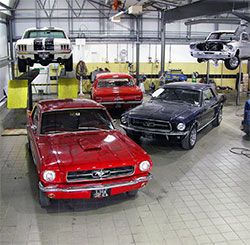 A few of the Ford Mustangs we restore in our workshop